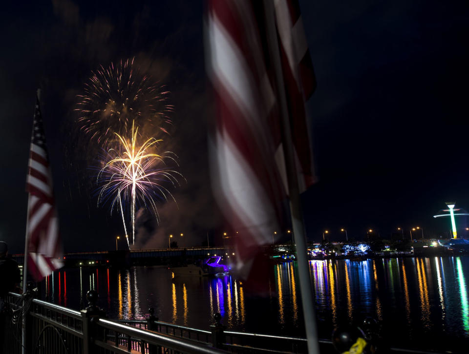 <p>Fireworks explode over the Saginaw River on the second day of the Bay City Fourth of July Festival from Wenonah Park Friday, June 30, 2017, in Bay City, Mich. (Photo: Tori Schneider/The Bay City Times via AP) </p>