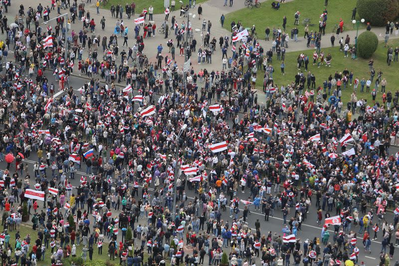 Belarusian opposition supporters hold a rally in Minsk