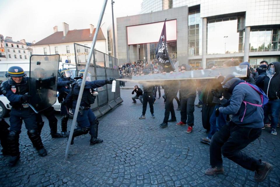 Protesters clashed with police in Paris as results came in on the French election (REUTERS)