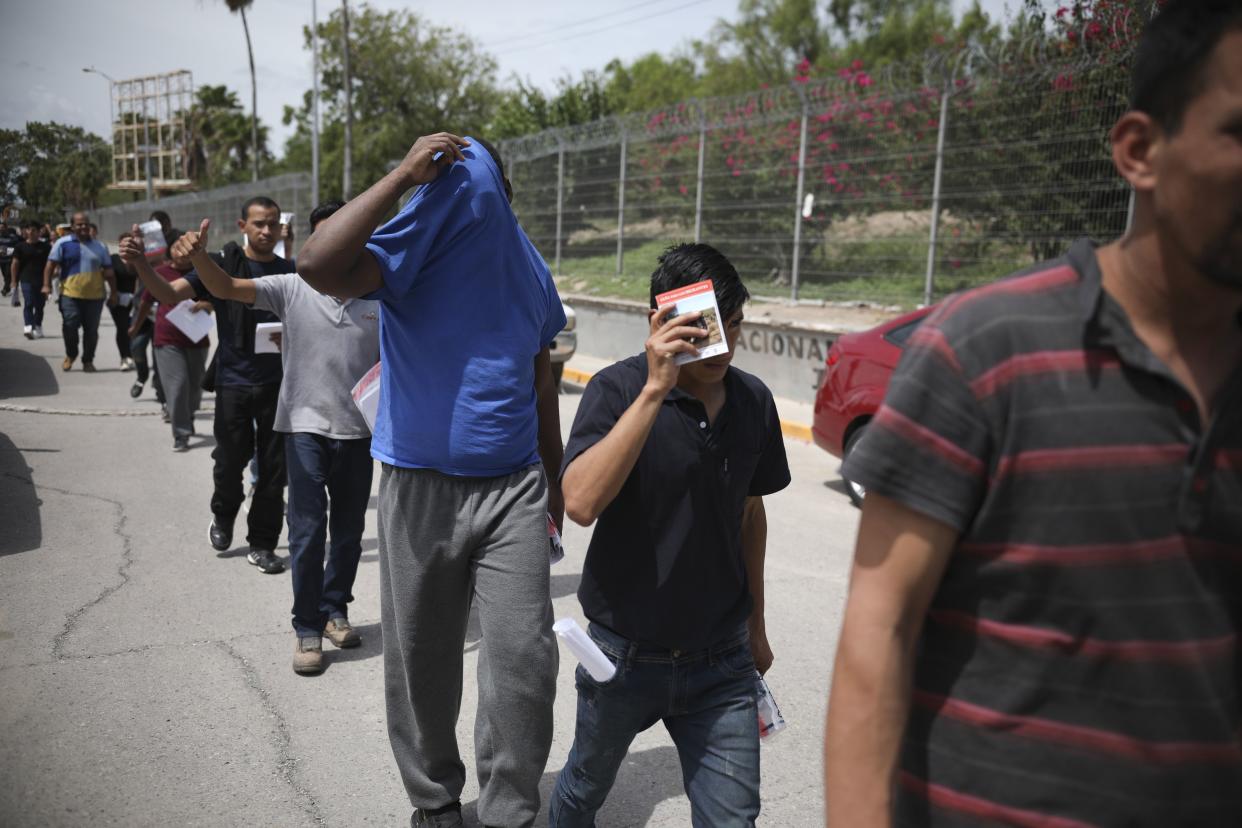 Migrants return to Mexico, using the Puerta Mexico bridge that crosses the Rio Grande river in Matamoros, Mexico, on the border with Brownsville, Texas.