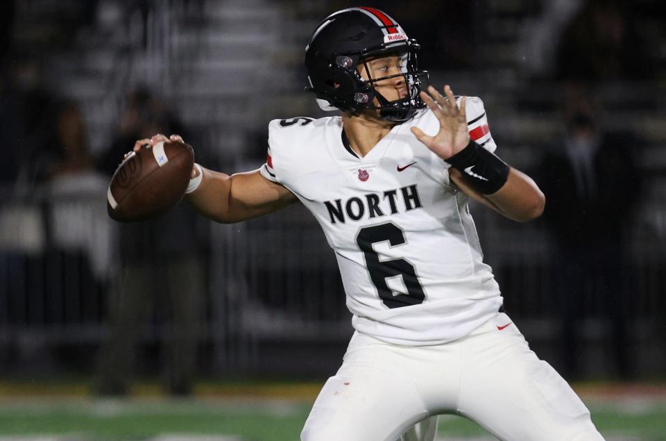 North Salem's TC Manumaleuna (6) throws the ball during the second quarter of the 5A state quarterfinal playoff game against the Silverton Foxes in Silverton, Ore. on Friday, Nov. 12, 2021.