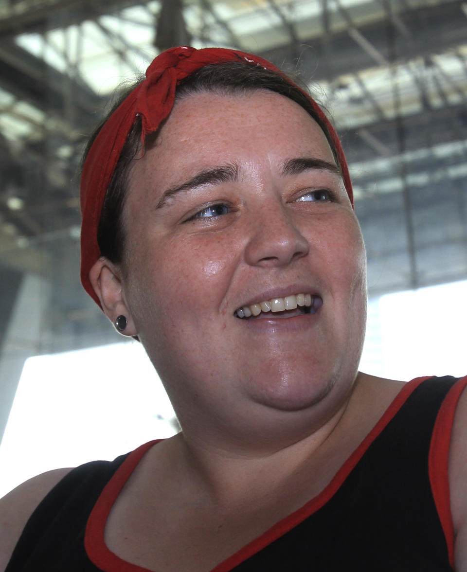 In this April 10, 2014 photo, Sinead Boylan, 26, of Liverpool, England, flying from Bangkok to Australia after backpacking across Asia, speaks during an interview at the airport in Bagnkok. At airports across Asia and around the world, Flight 370 and its 239 passengers and crew, now lost for more than a month, are topics of avid speculation and sometimes anxiety. Passengers typically remain confident about the safety of air travel, but some are distressed by the disappearance, which - given the number of people involved - is unprecedented in aviation industry. Boylan said "It's scarier than it was. I'm a little more cautious, a little more worried, I'd say." (AP Photo/Sakchai Lalit)