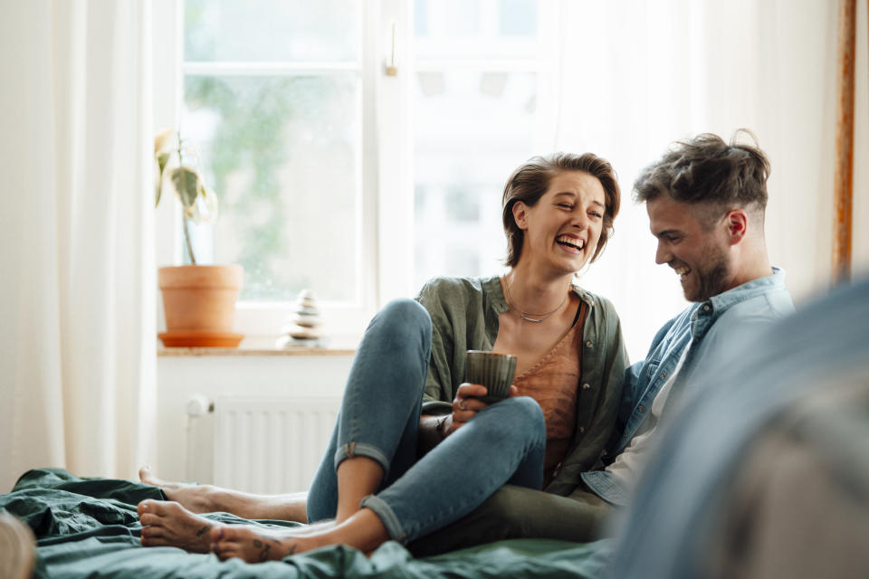 couple in bed with coffee