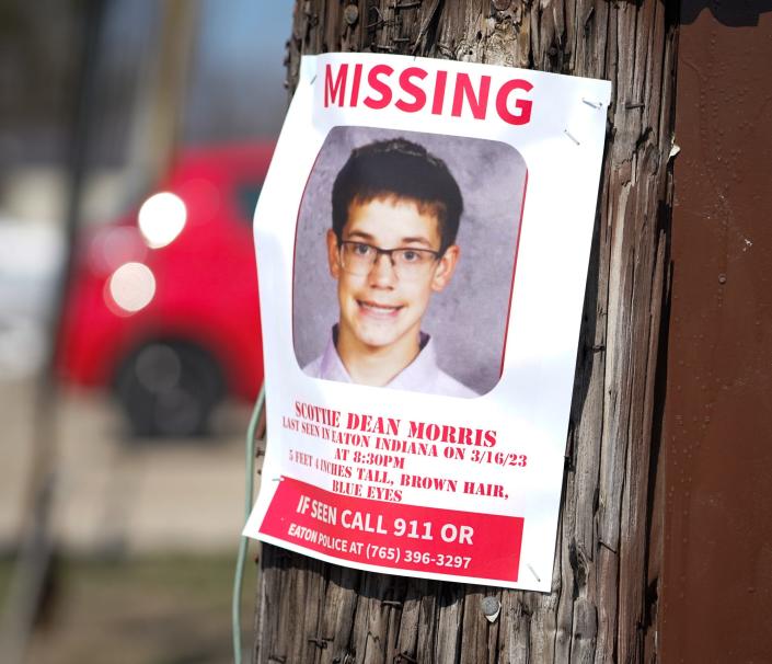 A flyer of missing child Scotty Dean Morris hangs at a Countrymark gas station in Eaton, Indiana, Monday, March 20, 2023.  Morris, 14, left her family's home in Eaton on Thursday, March 16, 2023, around 8:30 p.m. She has not been seen since.