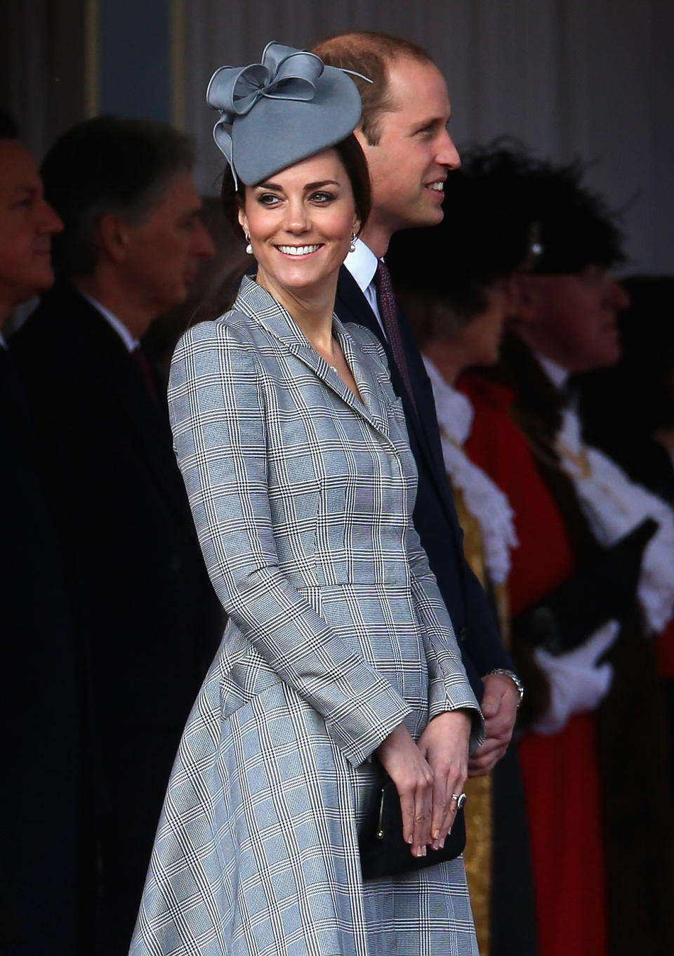 The Duchess of Cambridge wore an Alexander McQueen coat dress and Jane Taylor hat are seen as they welcome the President of Singapore Tony Tan Keng Yam, which was her first public appearance since announcing the birth of her second child.