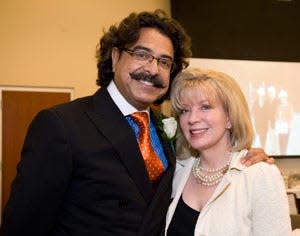 Illinois businessman Shahid Khan along with his wife, Ann, on the campus of University of Illinois in Champaign, Ill. The Jacksonville Jaguars have reached an agreement to sell the small-market franchise to Khan. Majority owner Wayne Weaver made the announcement Tuesday, Nov. 29, 2011, hours after he fired coach Jack Del Rio and gave general manager Gene Smith a three-year contract extension. Weaver called Khan "a great American success story" and said the Pakistan-born entrepreneur will keep the team in Jacksonville.