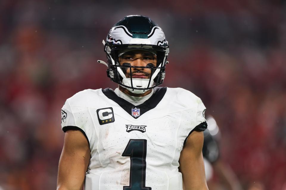 Jan 15, 2024; Tampa, Florida, USA; Philadelphia Eagles quarterback Jalen Hurts (1) looks on during the first half of a 2024 NFC wild card game against the Tampa Bay Buccaneers at Raymond James Stadium. Mandatory Credit: Nathan Ray Seebeck-USA TODAY Sports
