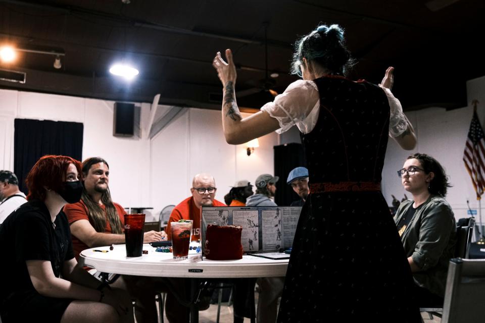 Kat Quijada (aka Kat Valentine) is the Dungeon Master for this game of Hazlan's Gauntlet. Here she prepares the gamers for this round of Dungeon & Dragons.