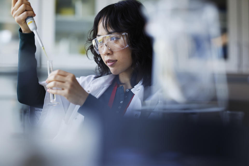 Young female scientist working in laboratory