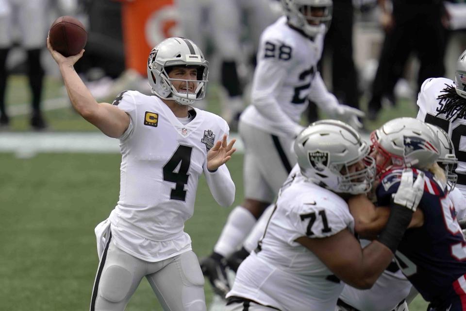 Las Vegas Raiders quarterback Derek Carr (4) passes against the New England Patriots in the first half of an NFL football game, Sunday, Sept. 27, 2020, in Foxborough, Mass. (AP Photo/Charles Krupa)