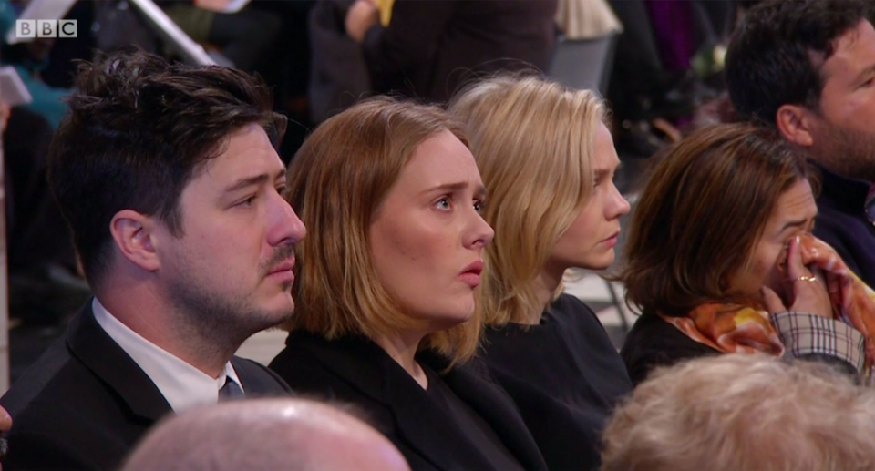 <em>(Left to right) Marcus Mumford, Adele and Carey Mulligan were among the guests paying their respects (BBC News)</em>