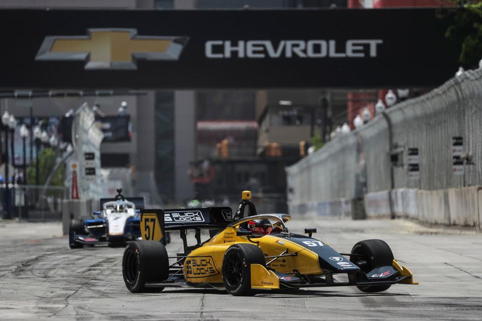 Indy NXT cars practice at turn 2 during the Free Prix Day of Detroit Grand Prix in Detroit on Friday, June 2, 2023.