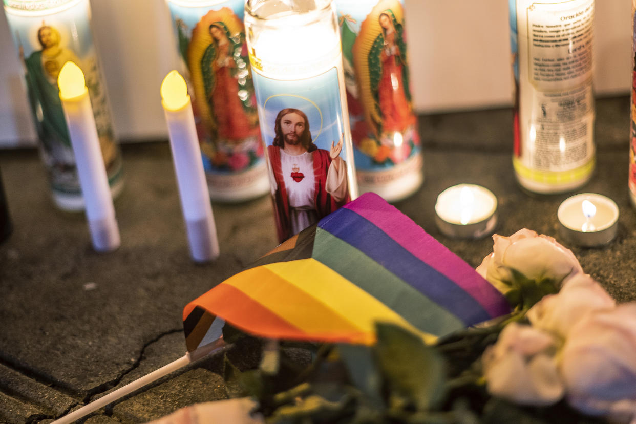 A memorial sprang up for the victims of Club Q in Colorado Springs, Colo., outside Rocco's WeHo in West Hollywood, Calif., Sunday, Nov. 20, 2022. (AP Photo/Damian Dovarganes)