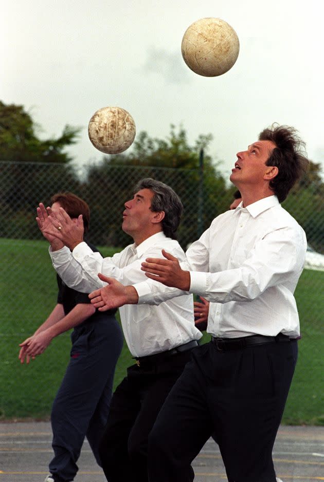 Labour leader Tony Blair takes part in a ball-heading contest with Newcastle United boss Kevin Keegan in (Photo: Neil Munns - PA Images via Getty Images)