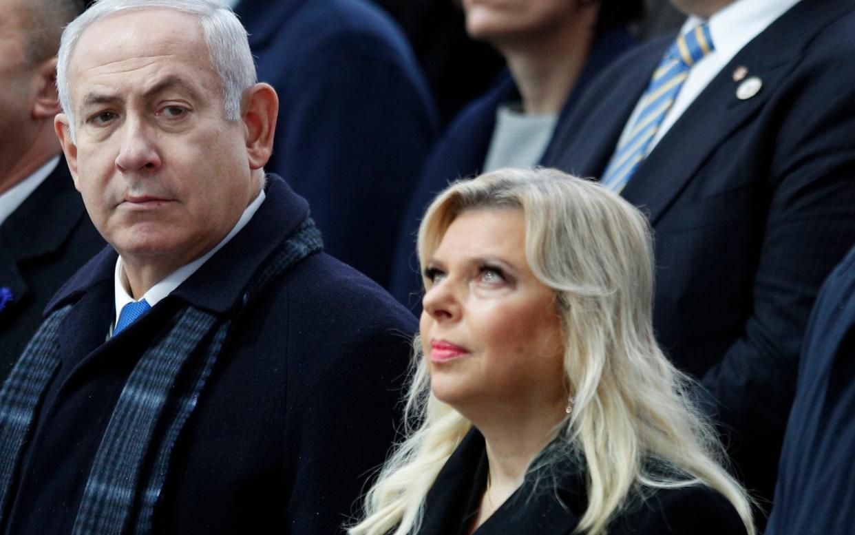 Police say there is enough evidence to charge Israeli Prime Minister Benjamin Netanyahu and his wife Sara - Pool AP