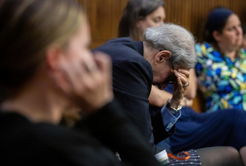 Samantha Woll's father, Douglas Woll, holds his head down as Michael Jackson-Bolanos testifies during their murder trial of the homicide of Samantha Woll at Frank Murphy Hall of Justice in Detroit on July 3, 2024.