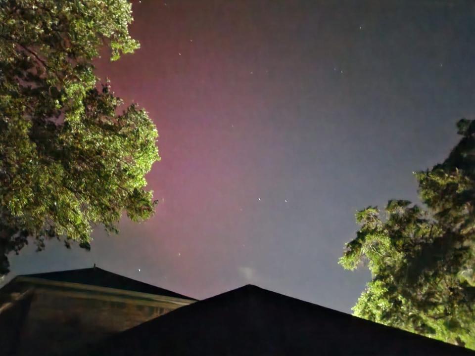 Northern Lights displayed outside a home in Mobile, Alabama.