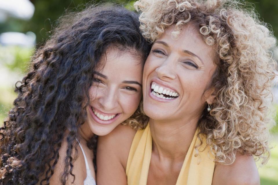 mother and daughter laughing