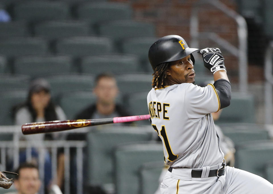 Pittsburgh Pirates second baseman Gift Ngoepe (61) follows through on a game-winning two-run double in the 10th inning of a baseball game against the Atlanta Braves Wednesday, May 24, 2017, in Atlanta. Pittsburgh won 12-5. (AP Photo/John Bazemore)