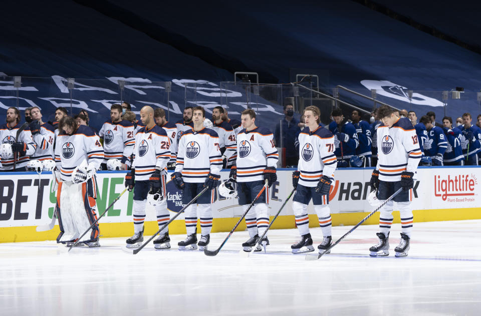 TORONTO, ON - JANUARY 5: Edmonton Oilers players stand for the national anthem before playing the Toronto Maple Leafs at the Scotiabank Arena on January 5, 2022 in Toronto, Ontario, Canada. (Photo by Mark Blinch/NHLI via Getty Images)