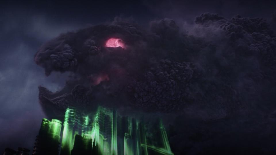 A giant purple cloud monster with red eyes and a mouth forming over the green outline of buildinds