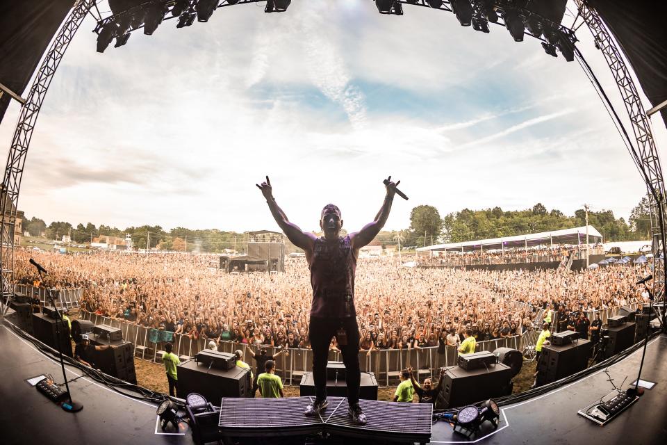 Jose 'Metal Ambassador' Mangin gets fans pumped up as he introduces Papa Roach Friday at INKcarceration 2022, held at the Ohio State Reformatory in Mansfield.