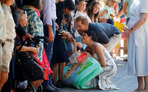 Prince Harry and Meghan in Australia - Credit: Reuters