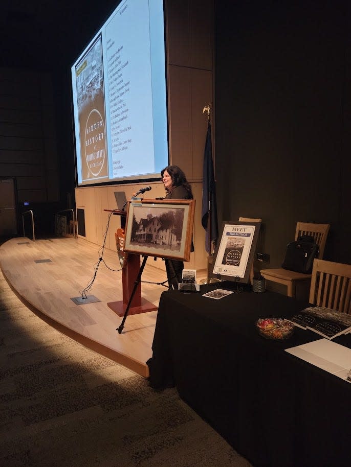 Mazur is shown during her presentation of Monroe's history at the River Raisin National Battlefield Park Vistiors Center.