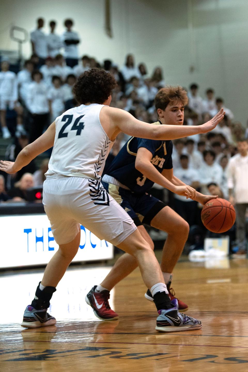 Council Rock South's Tim Rahill looks to pass as CR North's Adam Mahtat defends during CR South's 54-45 victory Tuesday night.