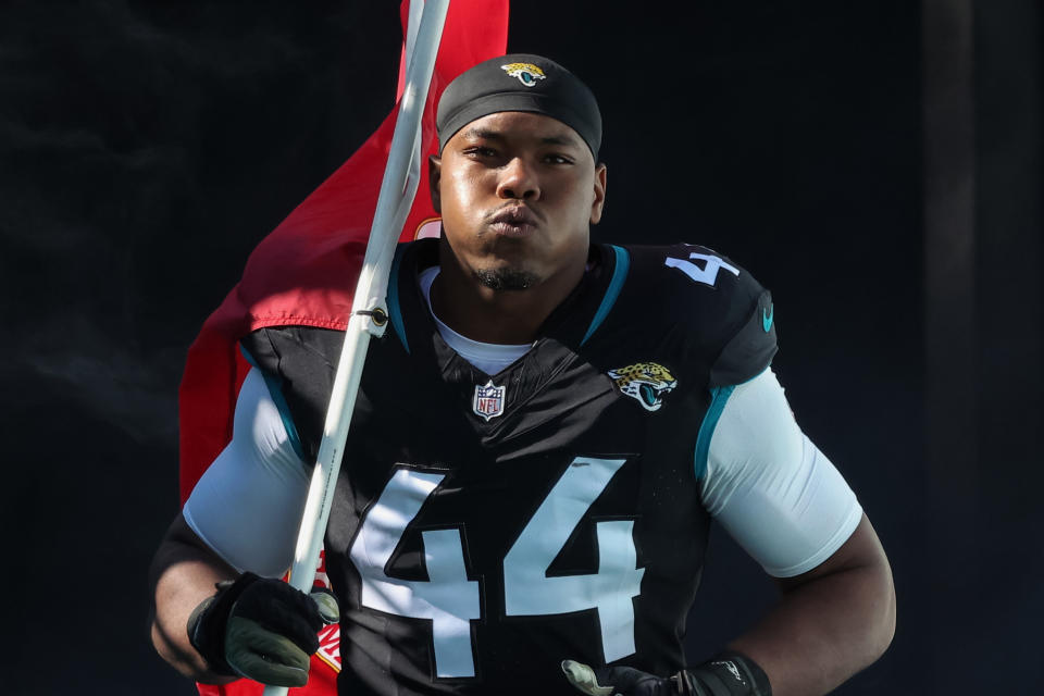 JACKSONVILLE, FLORIDA - NOVEMBER 19: Travon Walker #44 of the Jacksonville Jaguars during introductions prior to the game against the Tennessee Titans at EverBank Field on November 19, 2023 in Jacksonville, Florida. (Photo by Mike Carlson/Getty Images)