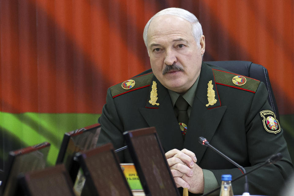 Belarusian President Alexander Lukashenko attends a meeting with top level military officials in Minsk, Belarus, Monday, Nov. 22, 2021. (Nikolay Petrov/BelTA Pool Photo via AP)