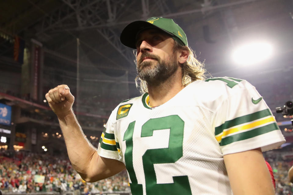 Seen here, Green Bay Packers quarterback Aaron Rodgers gives a fist pump after an NFL win over the Cardinals.