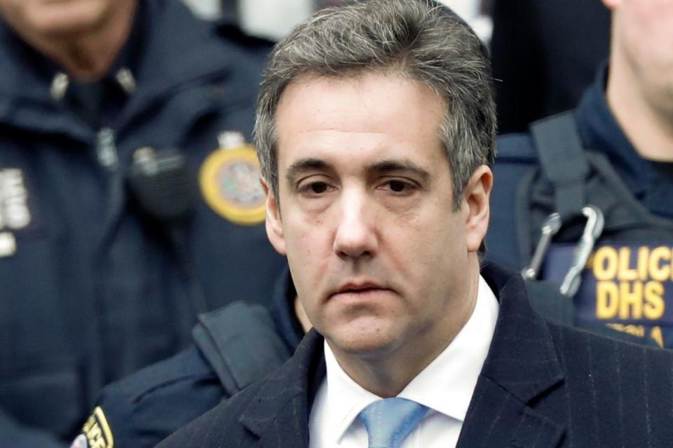 Michael Cohen leaves court in Manhatten after being sentenced to three years in prison (EPA)