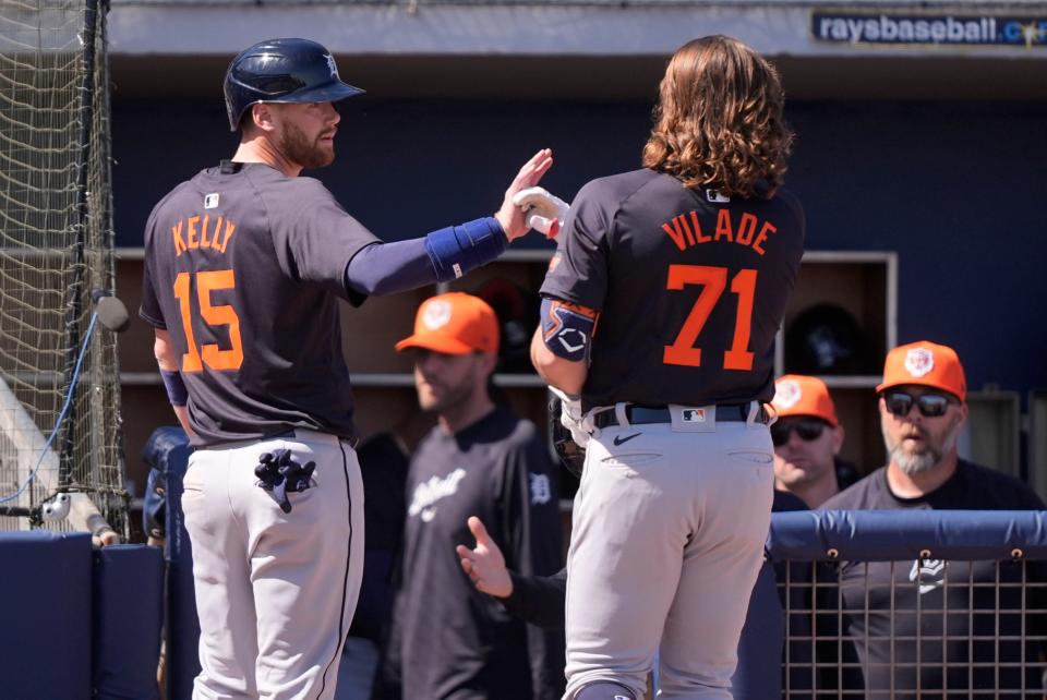 Detroit Tigers Carson Kelly (15) celebrates with Ryan Village after his 2-run home run in the fourth inning of a spring training baseball game against the Tampa Bay Rays at Charlotte Sports Park in Port Charlotte, Florida, on Sunday, Feb. 25, 2024.