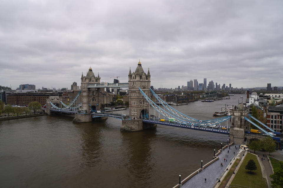 Tower Bridge in London, Saturday, May 8, 2021, against the backdrop of the skyline of the financial district. On what was dubbed Super Thursday, around 50 million voters were eligible to take part in scores of elections in the UK, some of which had been postponed a year because of the pandemic that has left the U.K. with Europe’s largest coronavirus death toll. (AP Photo/Alberto Pezzali)