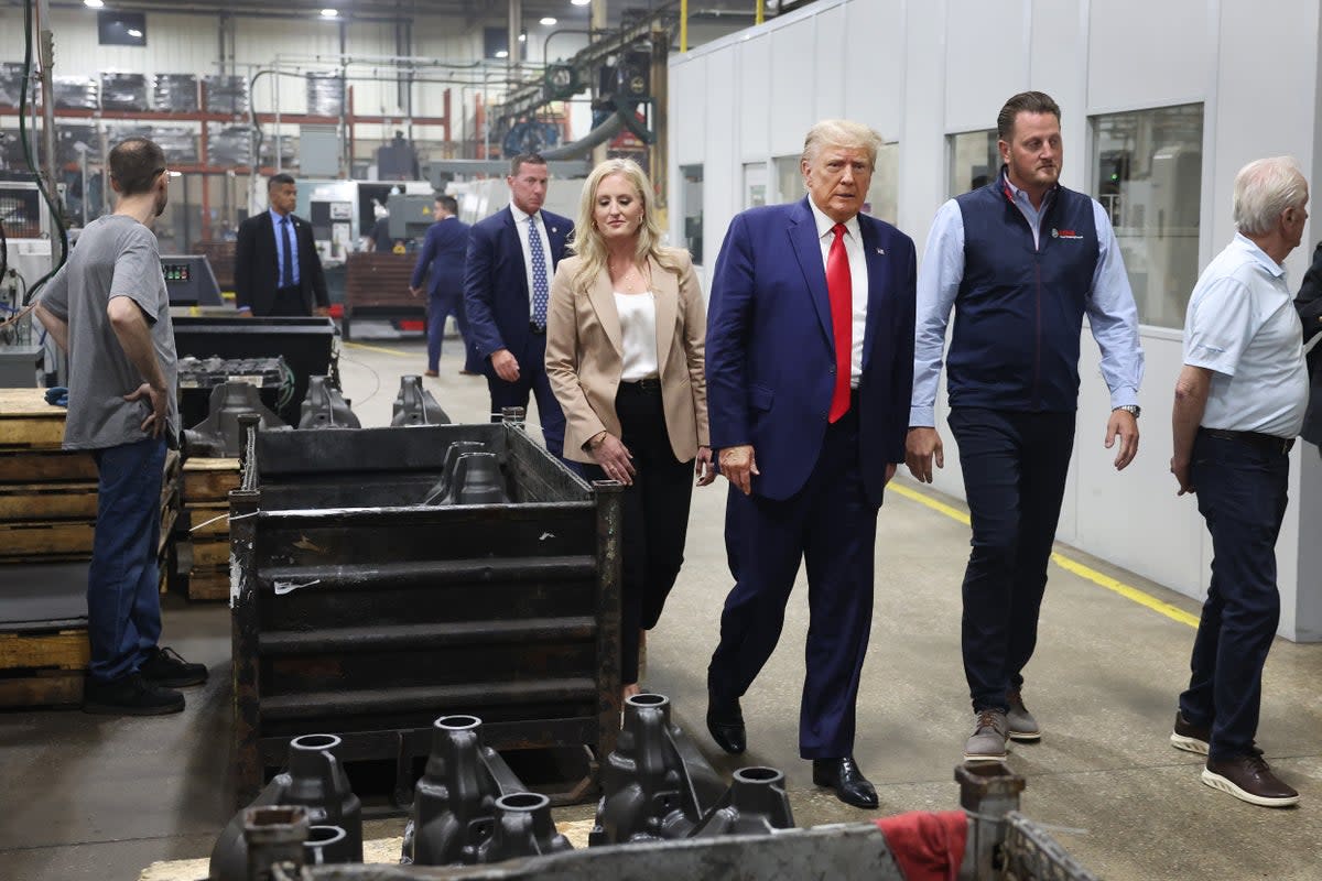 Republican presidential candidate former President Donald Trump tours Drake Enterprises, an automotive parts manufacturer, before speaking to guest at a small rally on September 27, 2023 in Clinton Township, Michigan. (Getty Images)