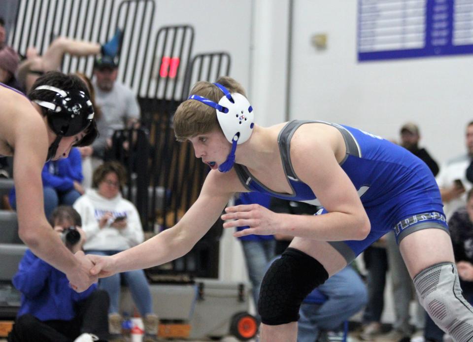 Auburn's Joey Ruzic begins his Class 1A Auburn Regional final at 120 pounds against Shelbyville's Bodee Fathauer on Saturday, Feb. 4, 2023.