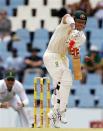 Australia's David Warner plays a shot during the third day of their cricket test match against South Africa in Centurion February 14, 2014. REUTERS/Siphiwe Sibeko