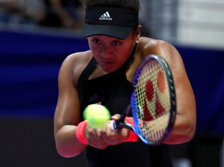 Tennis - Pan Pacific Open Women's Singles Semifinal match - Arena Tachikawa Tachihi, Tokyo, Japan - September 22, 2018. Naomi Osaka of Japan returns a ball to Camila Giorgi of Italy. REUTERS/Toru Hanai