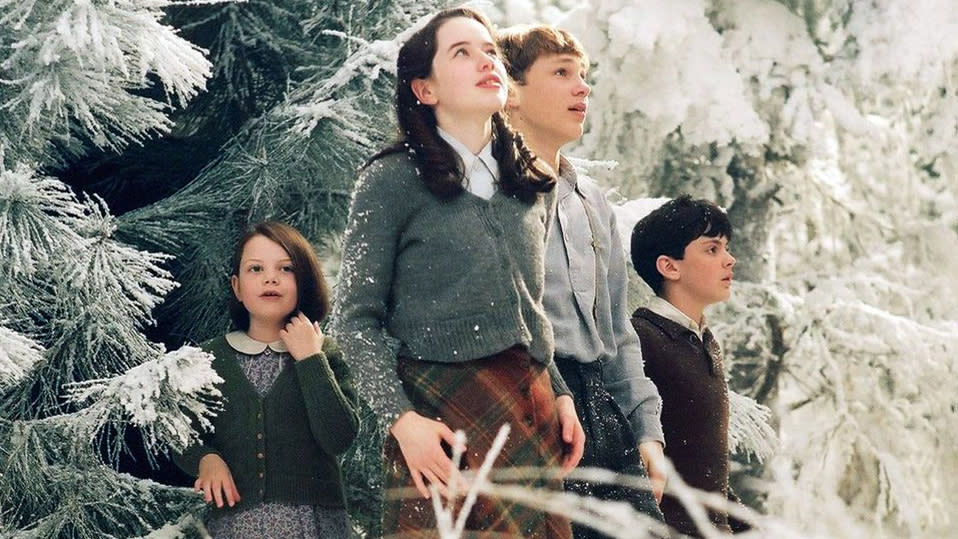 The Pevensie kids arrive in the snowy world of Narnia