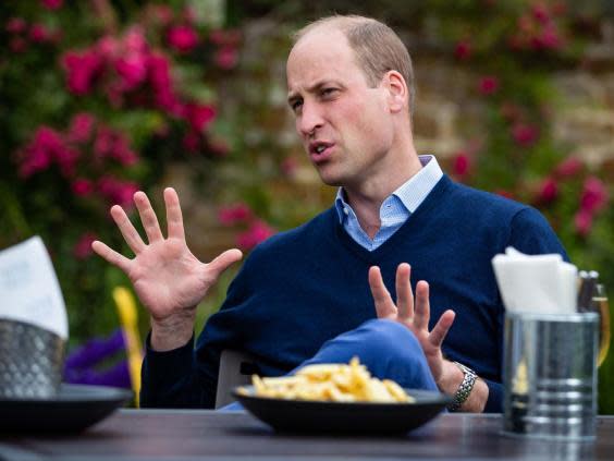 The Duke of Cambridge talks to the landlords and workers at The Rose and Crown pub in Snettisham, Norfolk. (PA)