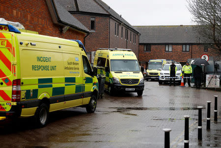 FILE PHOTO: Emergency services vehicles are parked behind a pub that was visited by former Russian intelligence officer Sergei Skripal and his daughter Yulia before they found poisoned; and which remains closed; in Salisbury, Britain, March 28, 2018. REUTERS/Peter Nicholls/File Photo