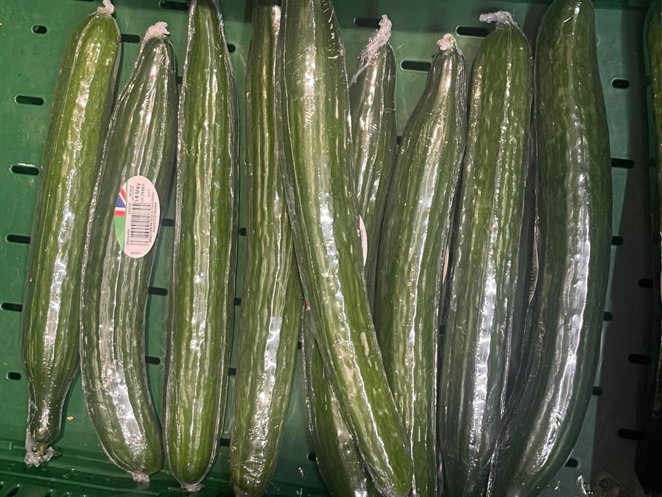 pile of cucumbers at aldi