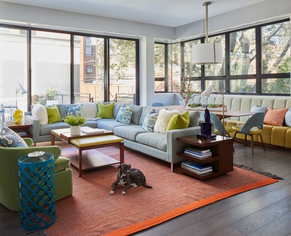 <p>A rug ushers in a dose of color. Design by <a href="https://deringhall.com/interior-designers/james-thomas-interiors" rel="nofollow noopener" target="_blank" data-ylk="slk:James Thomas Interiors;elm:context_link;itc:0;sec:content-canvas" class="link ">James Thomas Interiors</a>.</p>