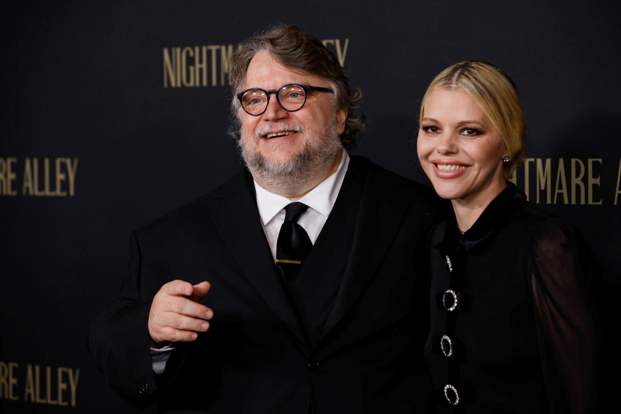 Director Guillermo Del Toro and writer Kim Morgan attend the premiere of 