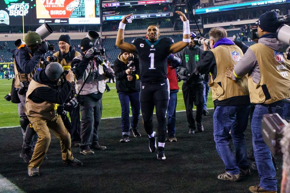 Philadelphia Eagles quarterback Jalen Hurts (1) reacts to the win as he heads off the field following the game against the New York Giants, Sunday, Jan. 8, 2023, in Philadelphia. (AP Photo/Chris Szagola)