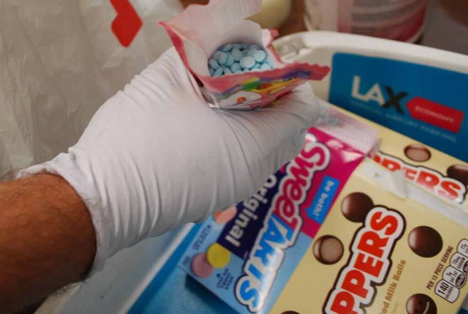 LA County Sheriff’s Narcotics Bureau Detectives and Drug Enforcement Agency (DEA) agents seized approximately 12,000 suspected fentanyl pills in several bags of candy and miscellaneous snacks.