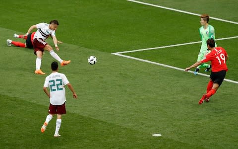 Javier Hernandez scores Mexico's second and his 50th goal for his country - Credit: AP Photo/Efrem Lukatsky