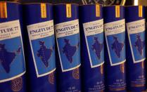 Indian single malt whisky, Longitude 77, bottles sit on a shelf for sale at a liquor store in Gurugram