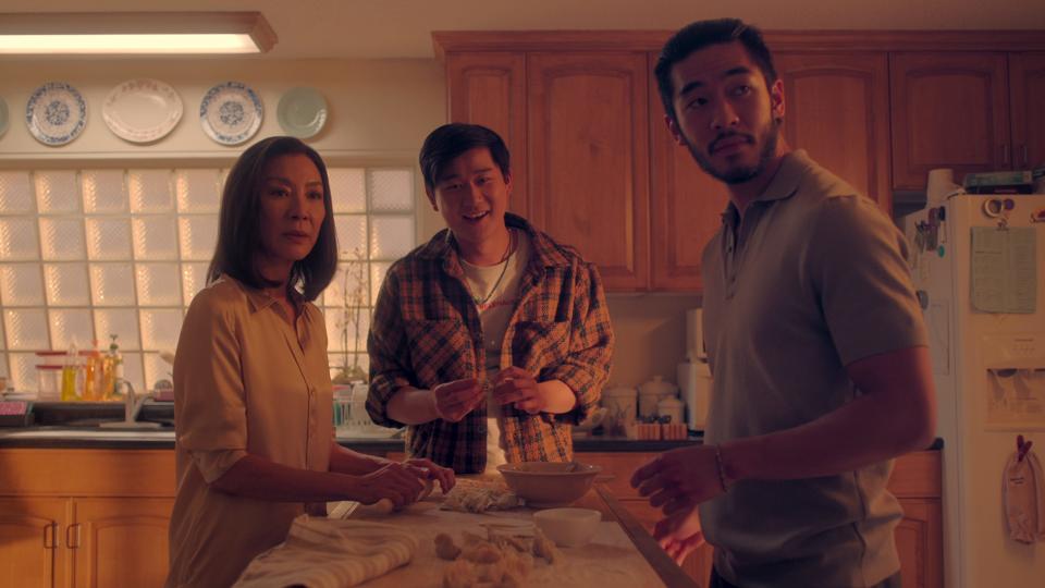 Michelle Yeoh as Mama Sun, Sam Song Li as Bruce Sun, Justin Chien as Charles Sun in "The Brothers Sun."